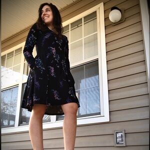 Black long sleeve dress with blue and purple floral pattern